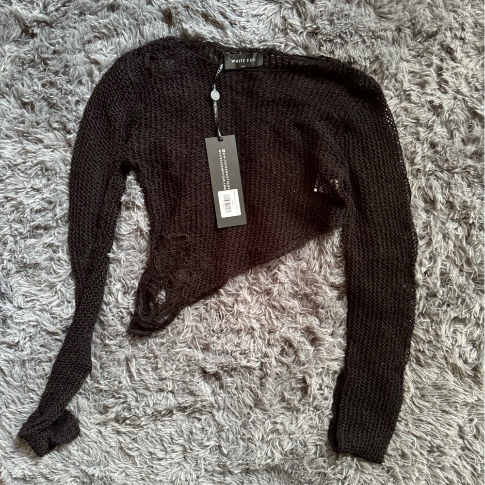 White fox top with tag